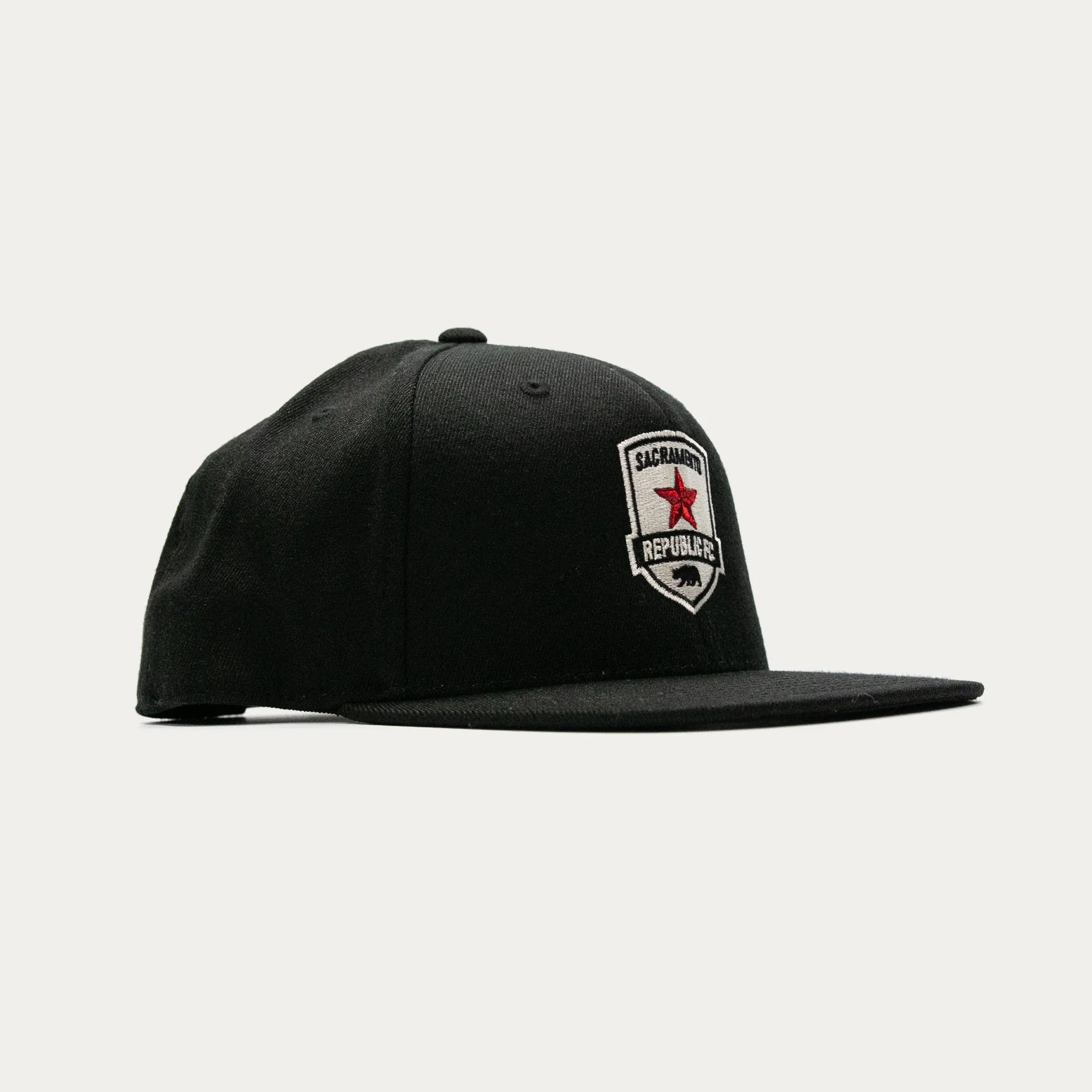 Flexfit® Primary Flatbill Trucker - Black